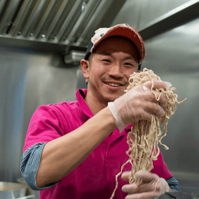 西岡　津世志氏の写真